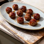 Hoelang spareribs bakken?