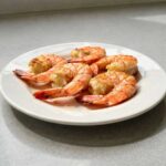 Hoe groene salade met appel, spek en ravioli maken
