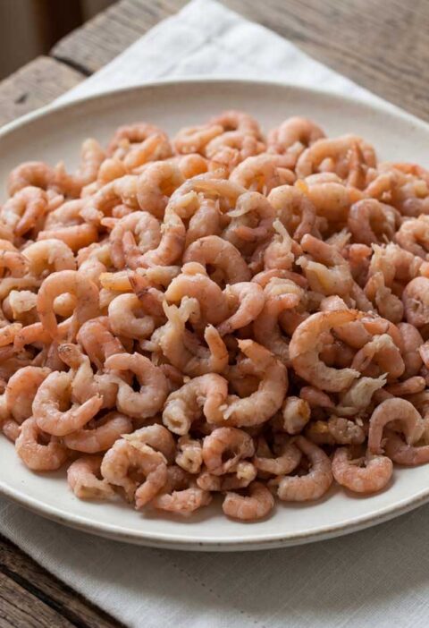 Garnalen koken, maar dat kan pas als ze gepeld zijn, aldus Wilhelmus Hengstmengel