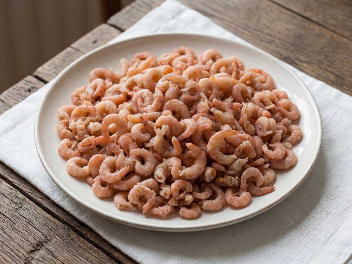 Garnalen koken, maar dat kan pas als ze gepeld zijn, aldus Wilhelmus Hengstmengel