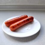 Hoelang chipolataworstjes bakken?