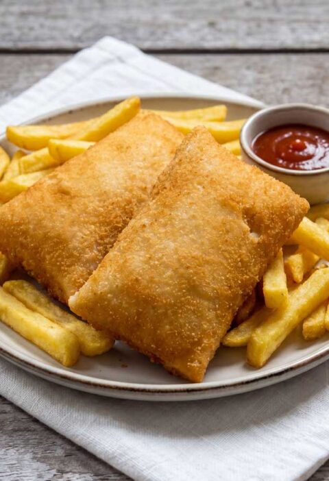 Kaassoufflé bakken in een friteuse. Wilhelmus Hengstmengel bakt dit in zonnebloemolie.