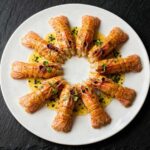 Hoelang zalmrollade bakken?